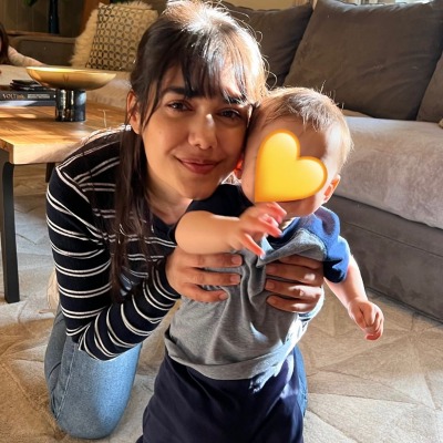 Tasie Lawrence helping her son, Charlie Jefferies, to walk.